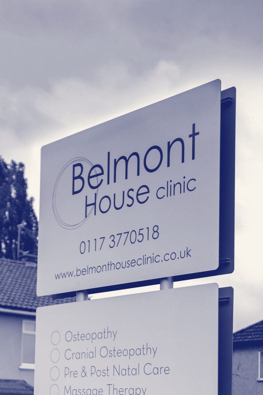The Belmont House Clinic sign on the roadside